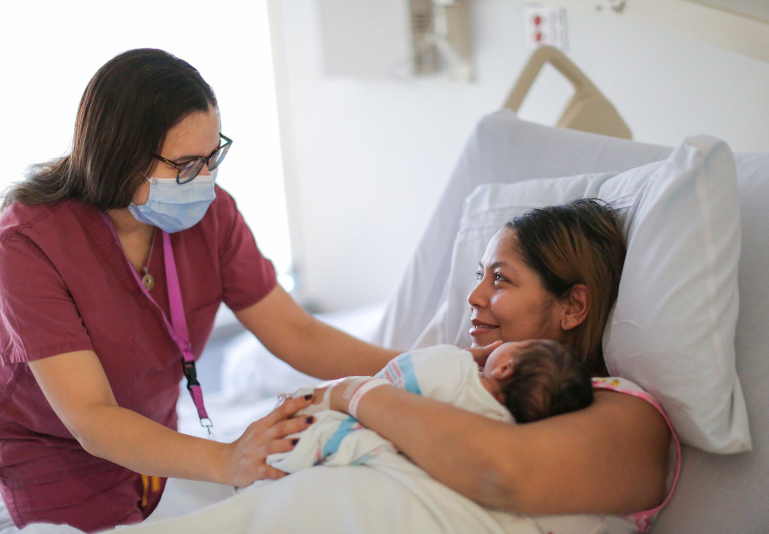 A nurse at NewYork-Presbyterian/Allen Hospital greets a patient on the postpartum floor of the hospital.